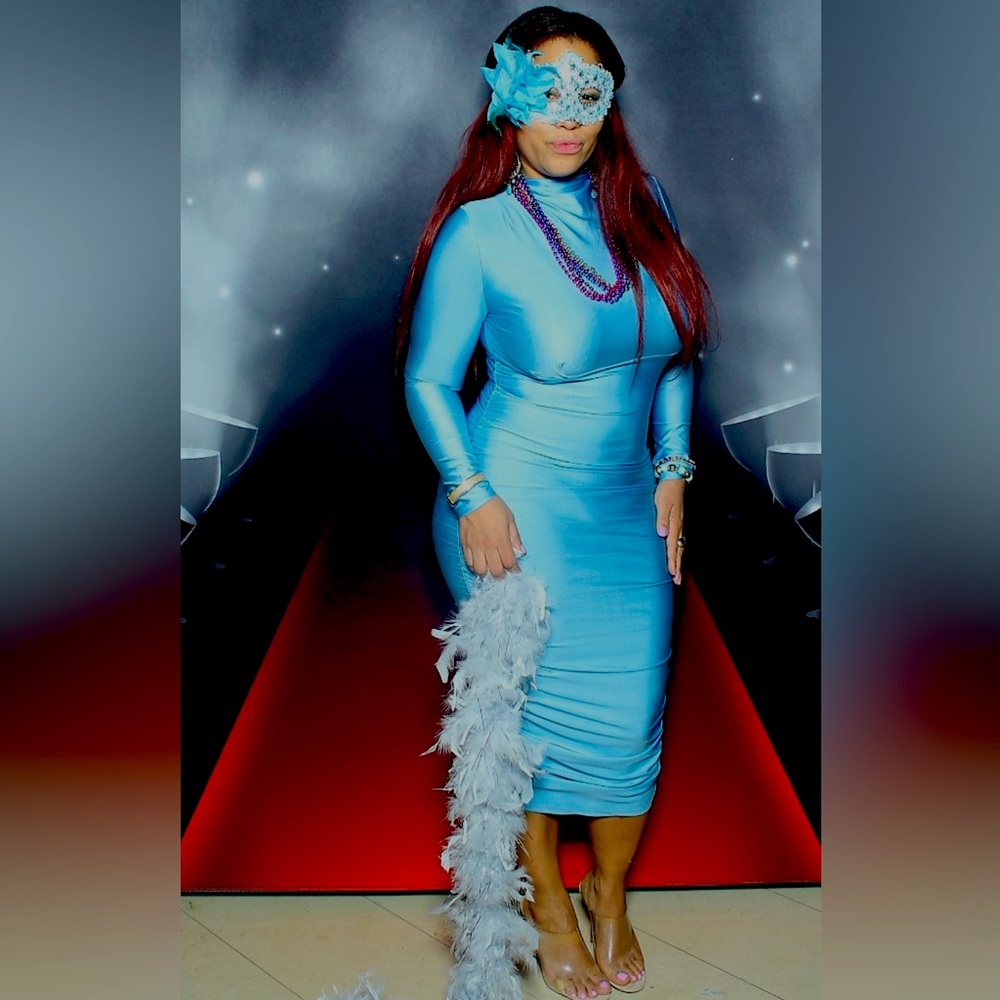 Bright blue form fitting dress.. Beautiful fabric Worn once